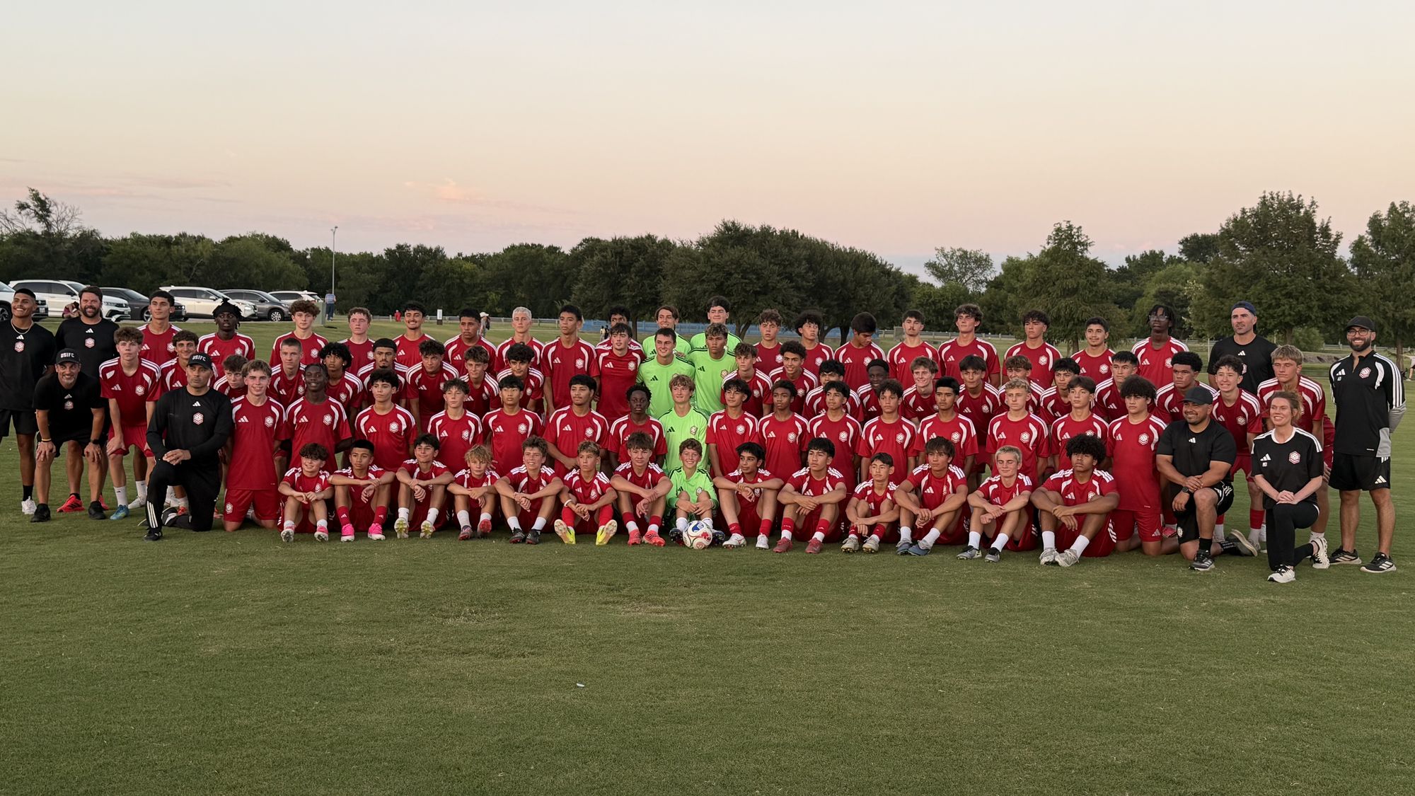 The full USIFC traveling group photographed together at sunset