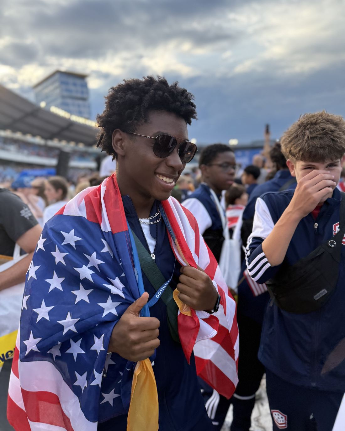 A USIFC player wrapped in the American flag after a match